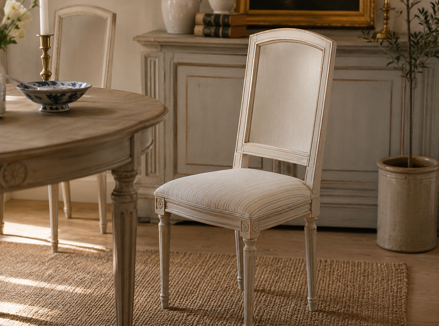 Pale-painted chair with stripes in Gustavian style